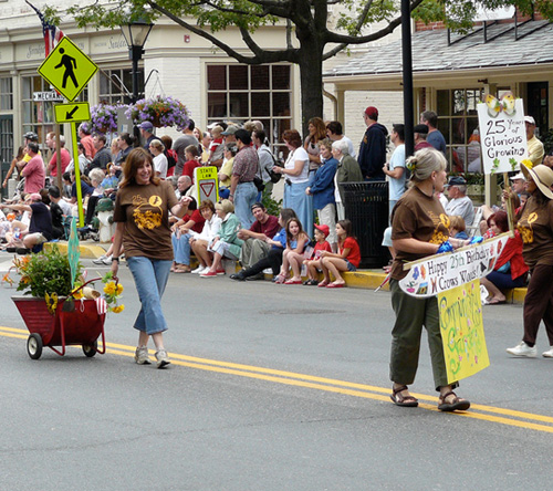 robin and laura walking in the parade